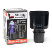 Universal car cup holder adapter expanding to fit large 40oz Yeti and Hydroflask water bottles in a center console.